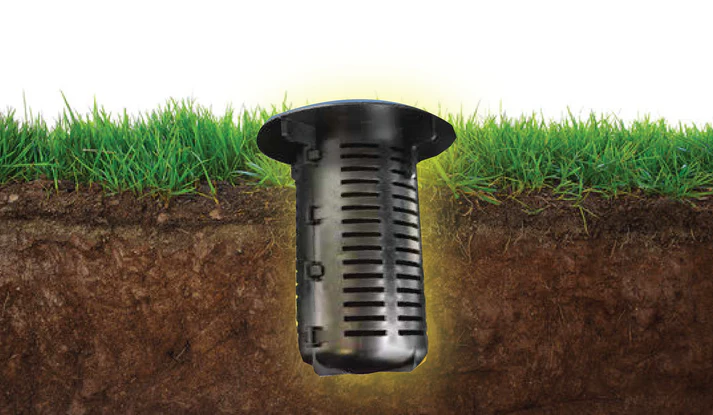 In-ground termite bait station installation